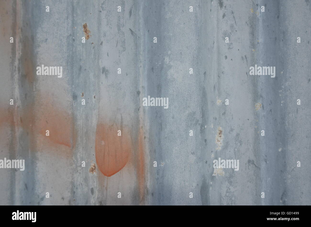 Blue container wall red spots old dirty white spots rippled Stock Photo