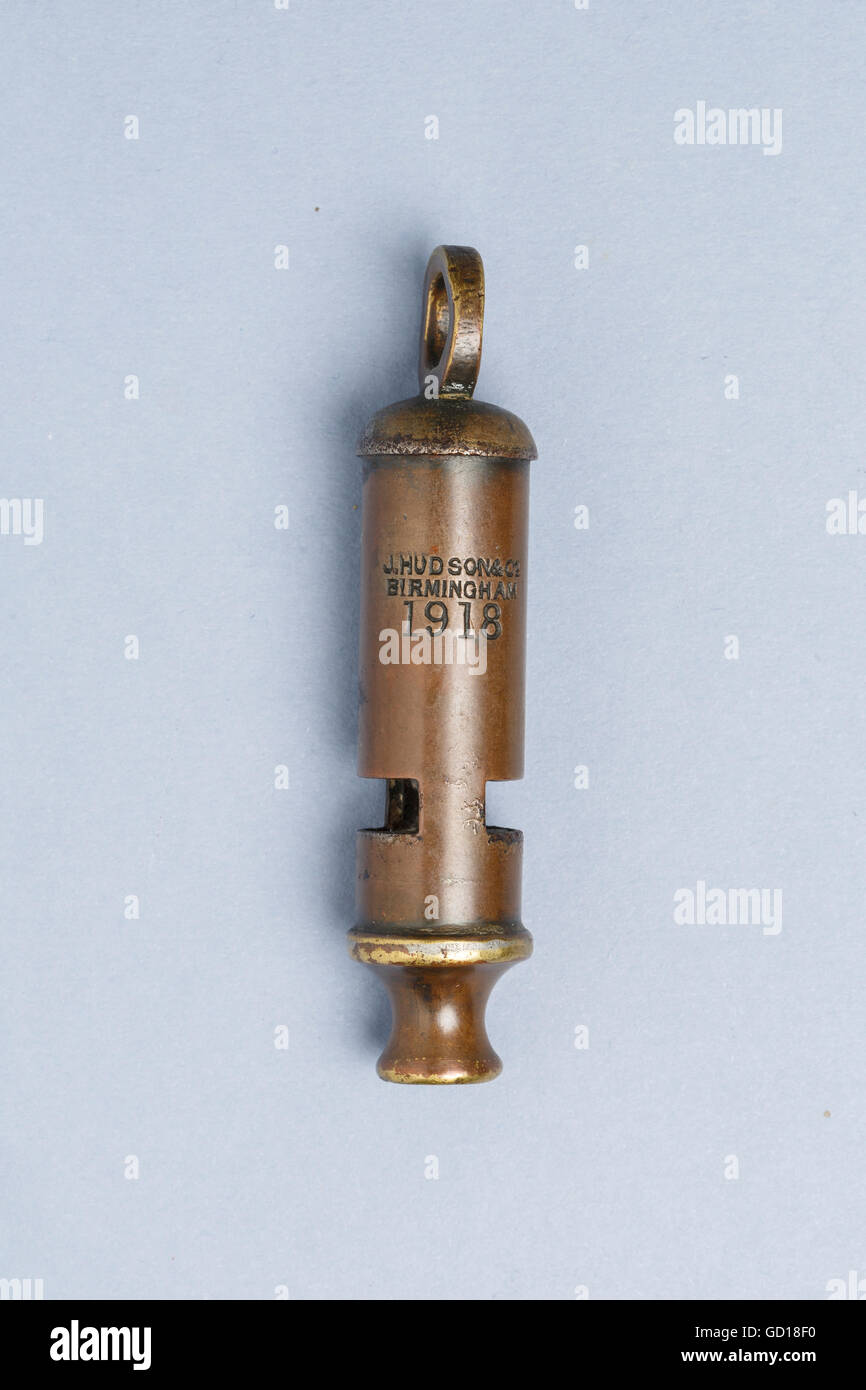 Military whistle, dated 1918 and made by J. Hudson and Co., Birmingham, used by officers to signal an advance. 'Over the top' Stock Photo