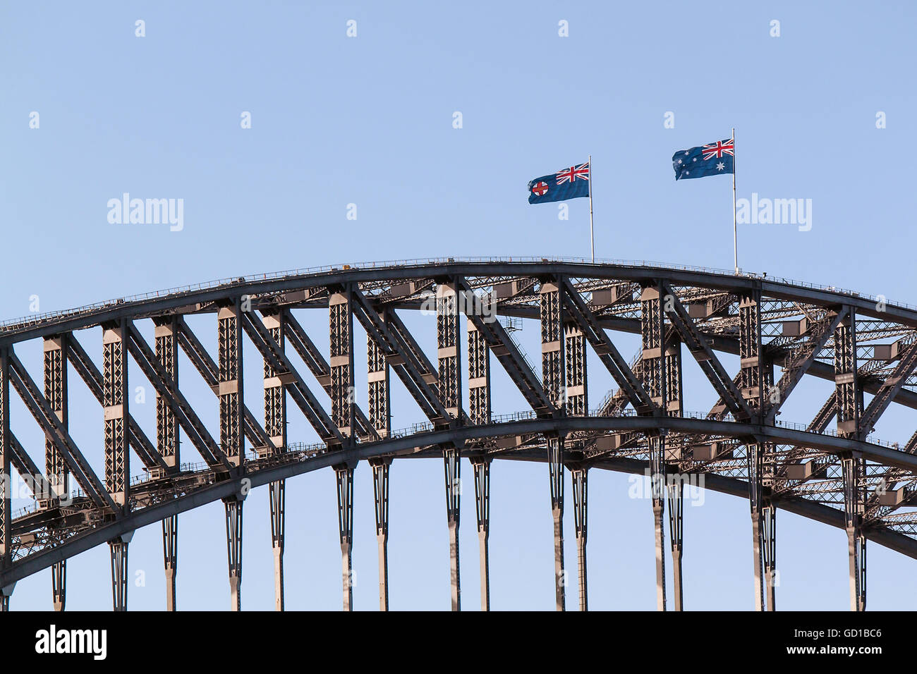 SYDNEY, NEW SOUTH WALES/AUSTRALIA – CIRCA DECEMBER 2015: Australian state flags fly over Sydney Harbour Bridge before the New Ye Stock Photo