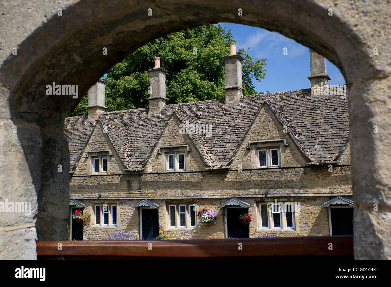 Gated entrance to Almshouses Church Street Chipping Norton Cotswolds UK Stock Photo