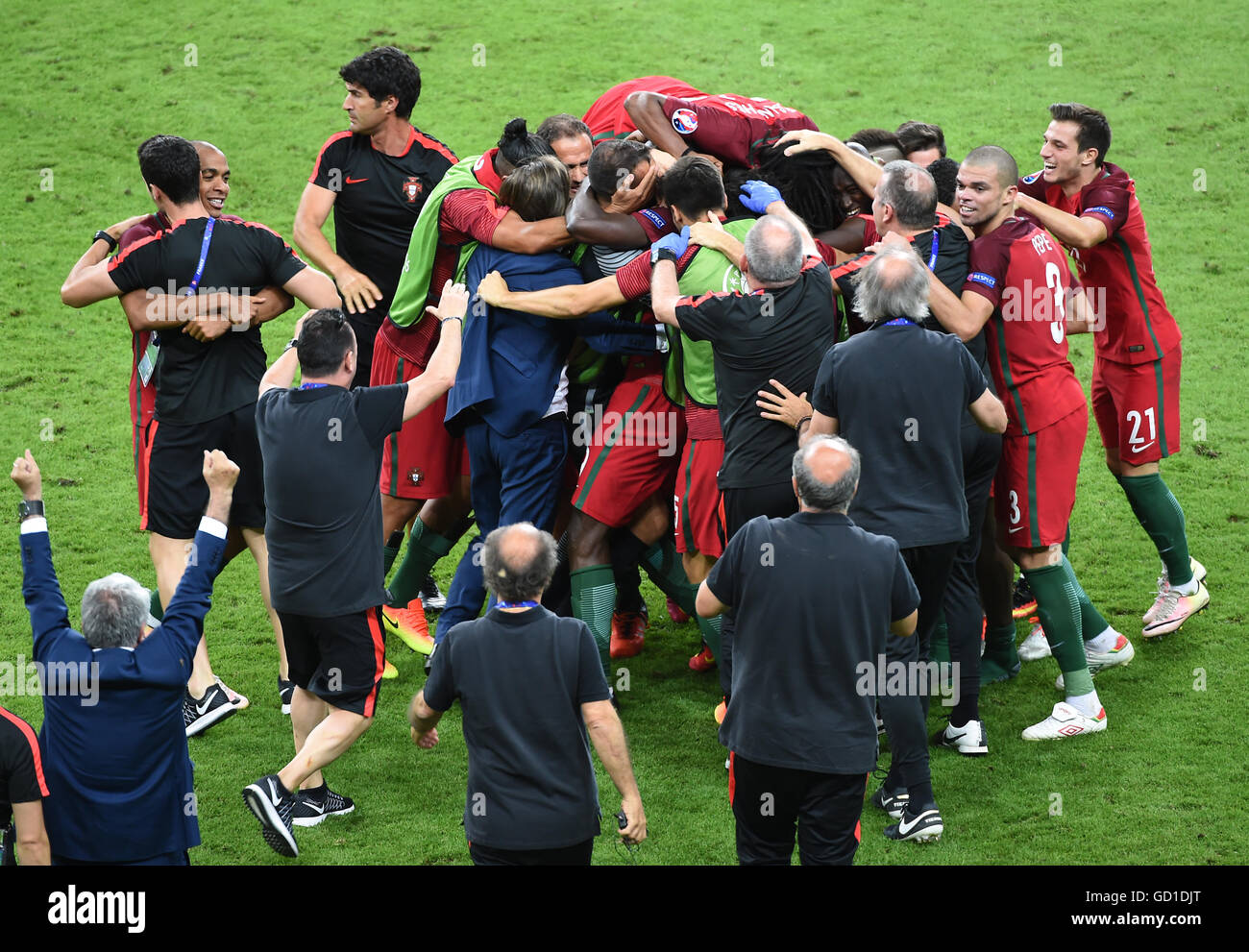 Portugal players celebrate after Eder (obscured) scores his side's first goal of the game during the UEFA Euro 2016 Final at the Stade de France, Paris. PRESS ASSOCIATION Photo. Picture date: Sunday July 10, 2016. See PA story SOCCER Final. Photo credit should read: Joe Giddens/PA Wire. RESTRICTIONS: Use subject to restrictions. Editorial use only. Book and magazine sales permitted providing not solely devoted to any one team/player/match. No commercial use. Call +44 (0)1158 447447 for further information. Stock Photo