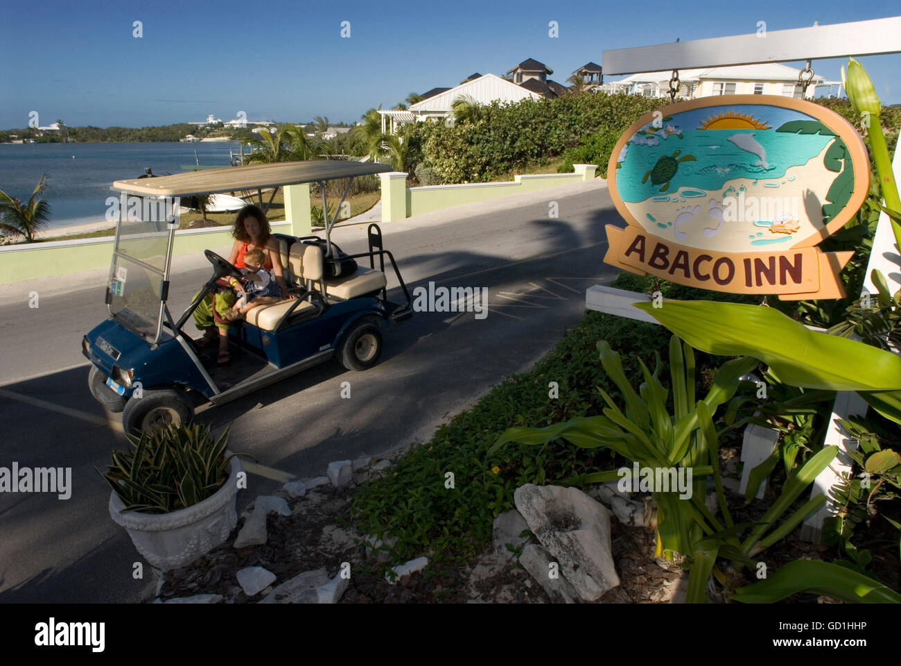Golf car parked outside the Abaco Inn. Hope Town, Elbow Cay, Abacos. Bahamas Stock Photo
