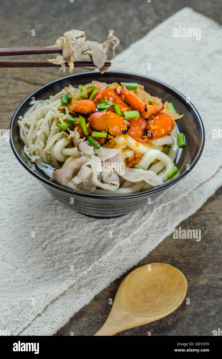 Korean hot spicy noodles with kimchi and seafood Stock Photo