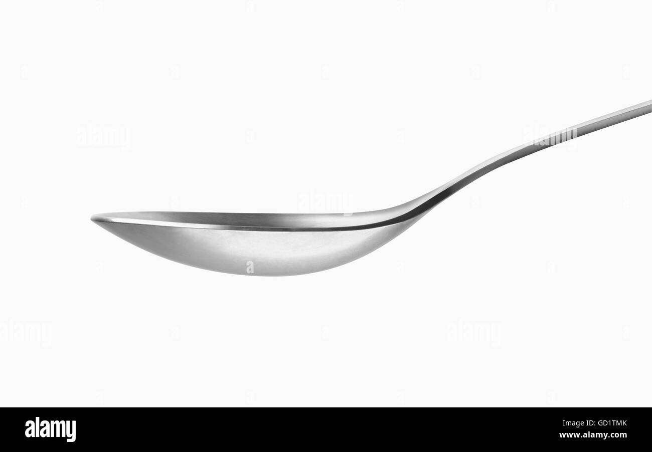 Silver spoon on a white background; Toronto, Ontario, Canada Stock Photo