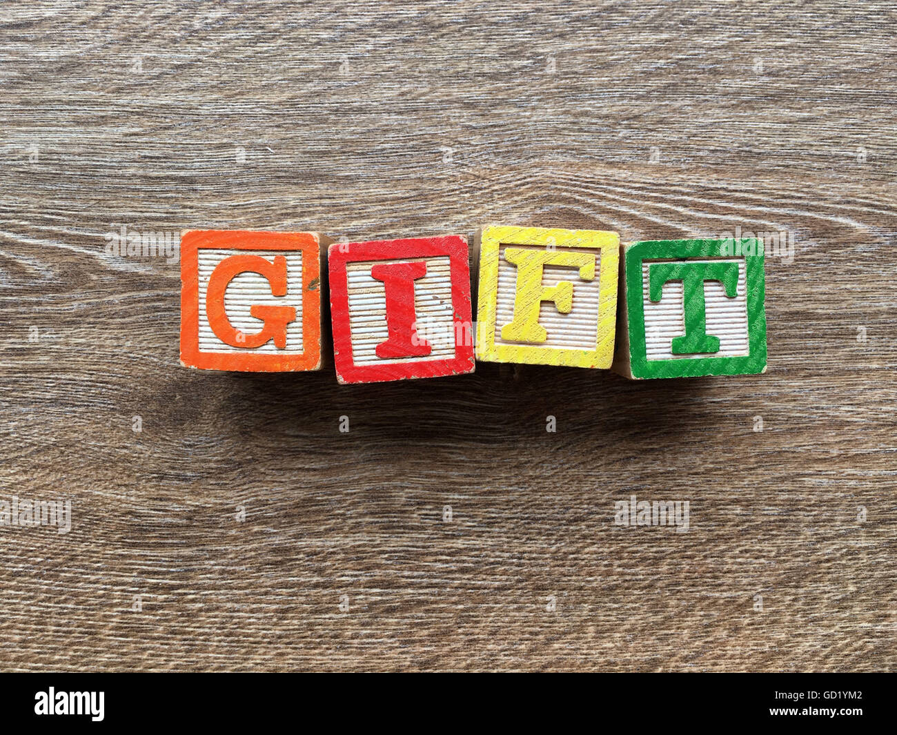 GIFT word written with wood block letter toys Stock Photo Alamy
