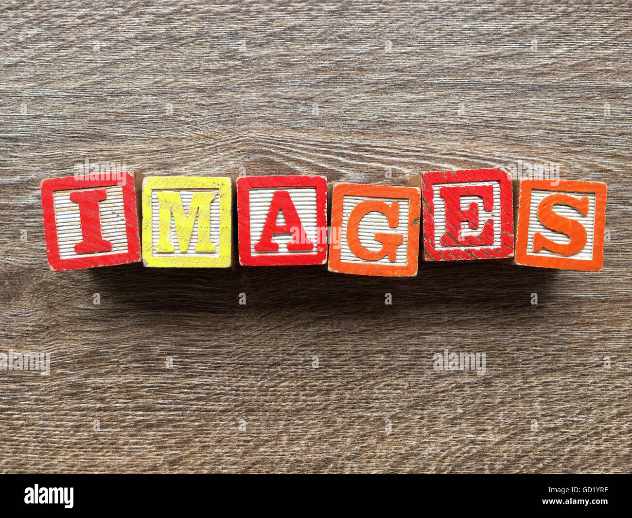 IMAGES written with wood block letter toys Stock Photo