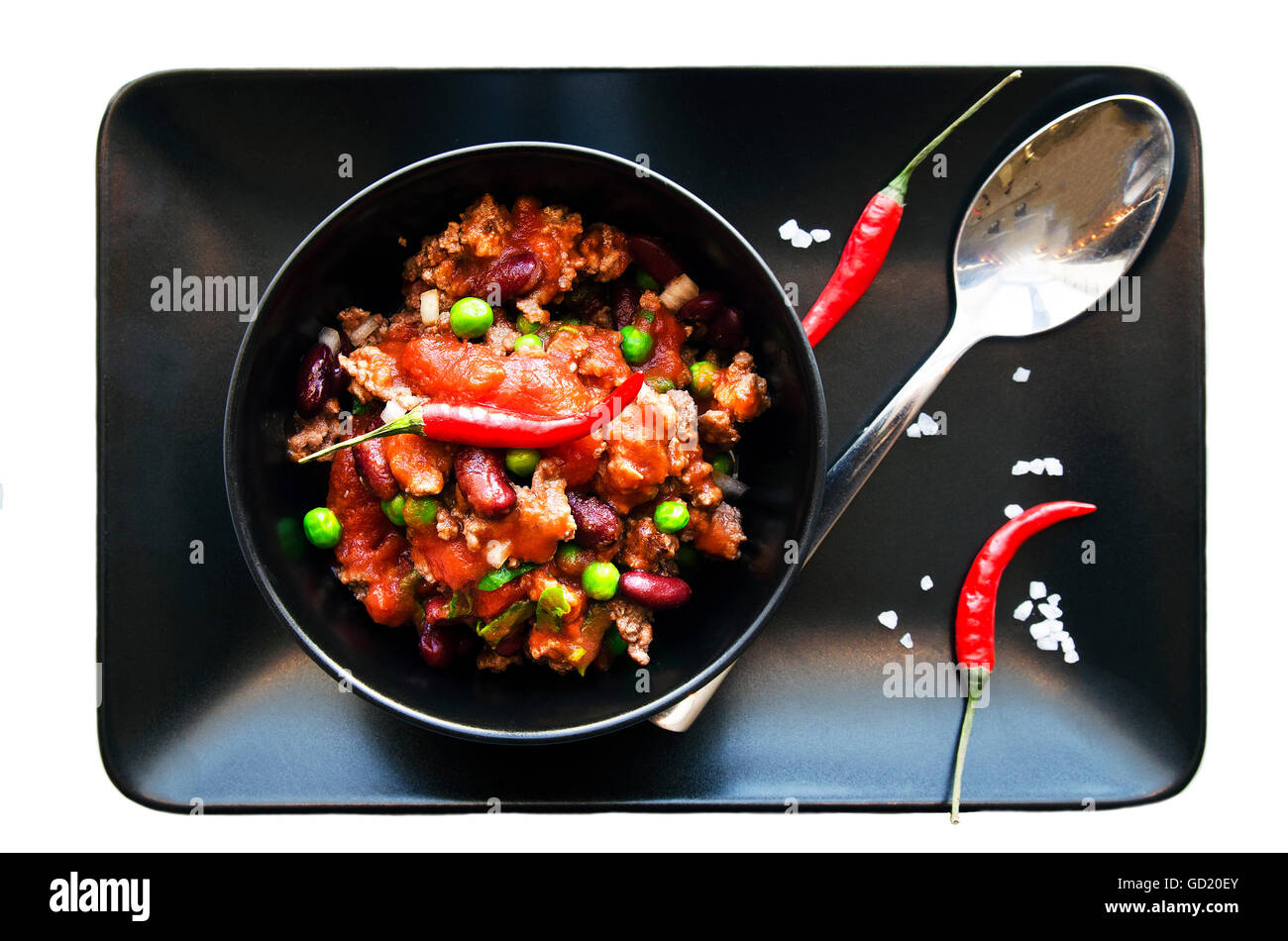 Chilli mexican Con Carne, black plate. Beans Stock Photo Alamy