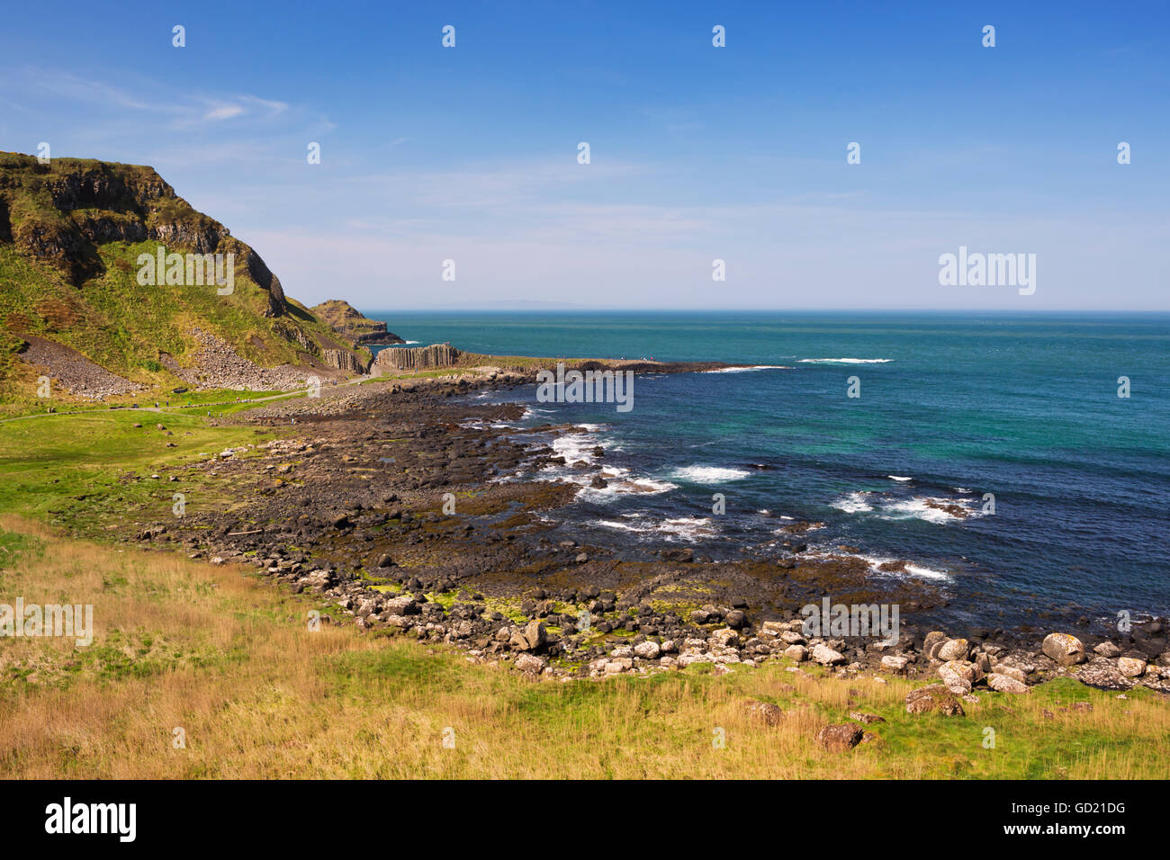 The rocky coast at the Giant's Causeway in Northern Ireland on a bright and sunny day. Stock Photo