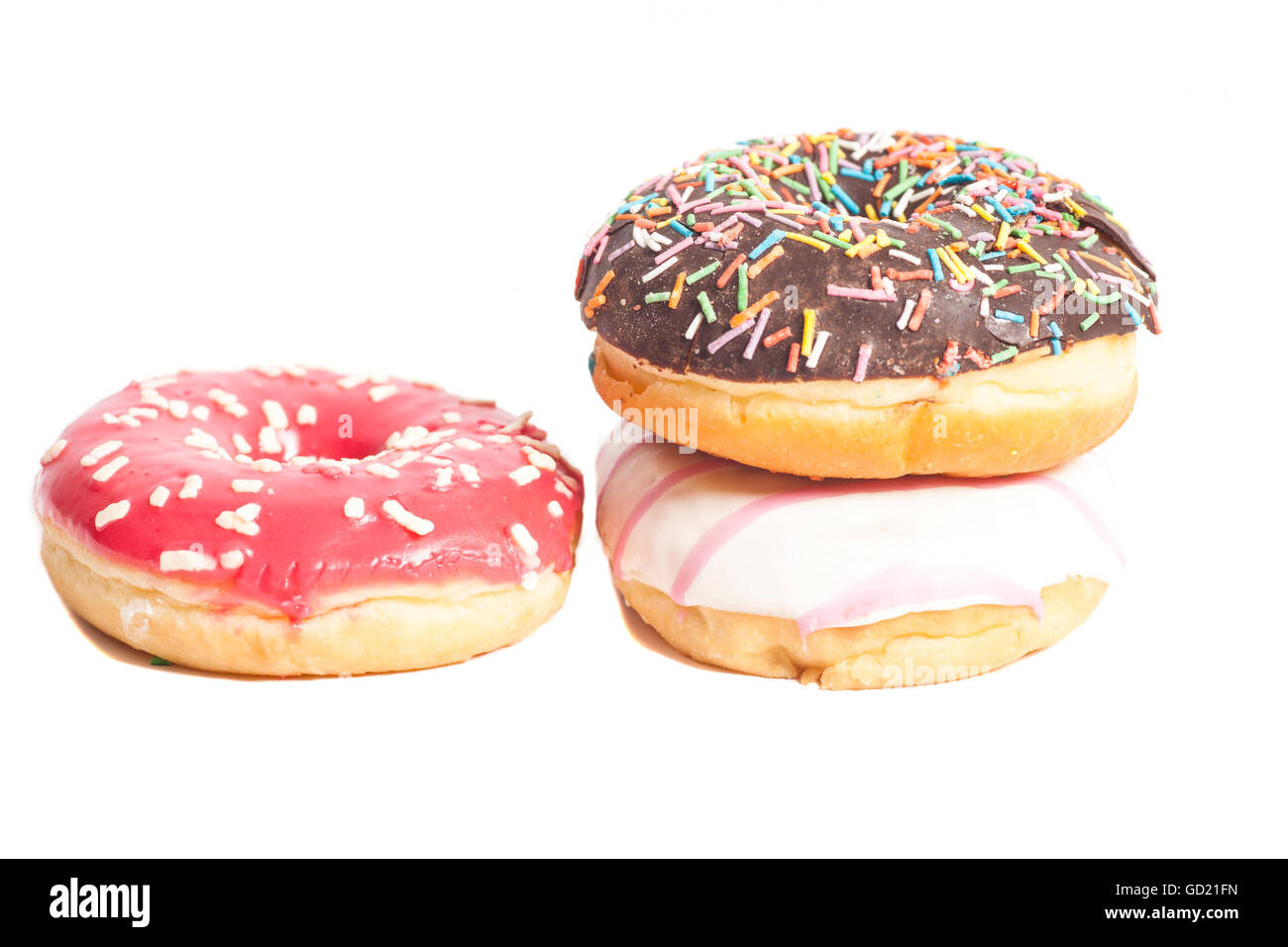 Three glazed donuts isolated on white background Stock Photo - Alamy