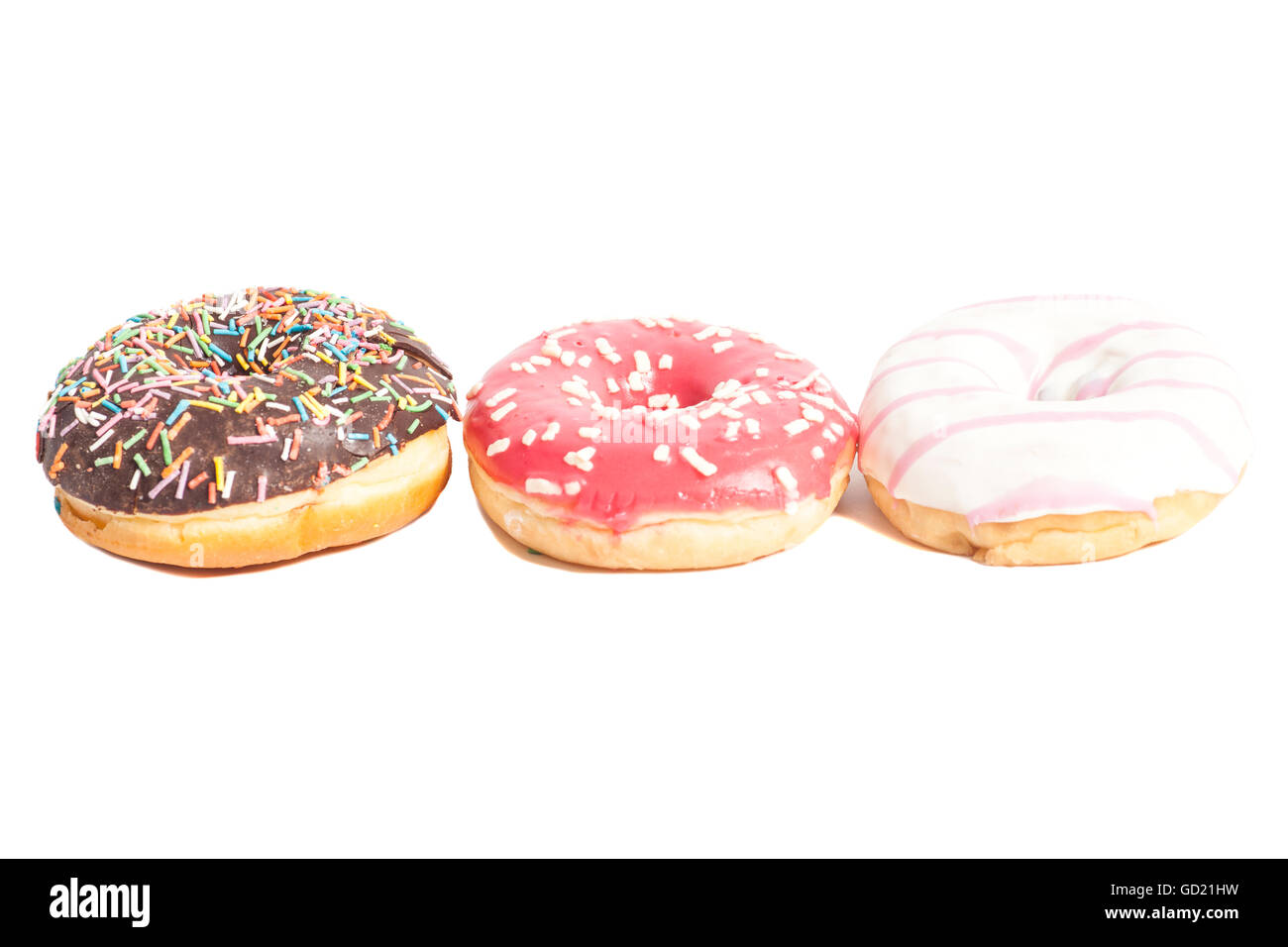 Three glazed donuts isolated on white background Stock Photo - Alamy