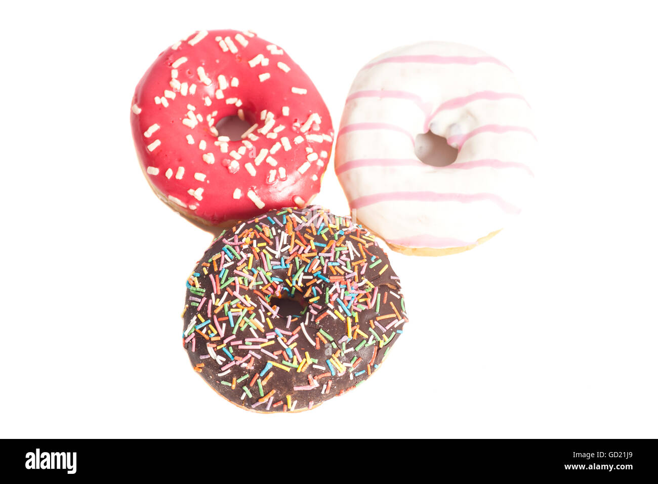 Three glazed donuts isolated on white background Stock Photo - Alamy