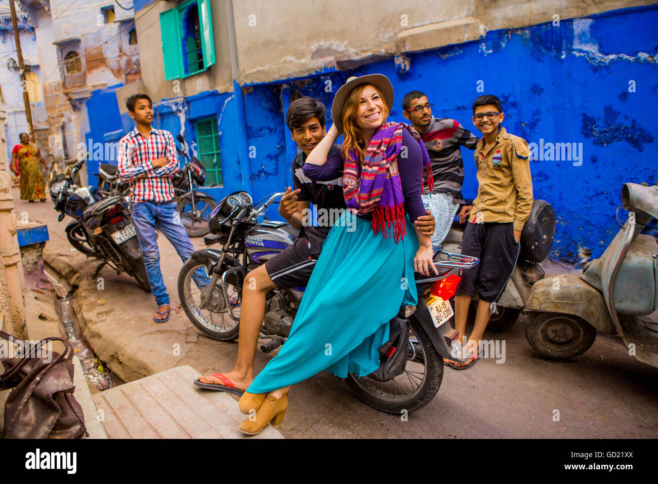 Woman standing in the blue streets of Jodhpur, the Blue City, Rajasthan, India, Asia Stock Photo