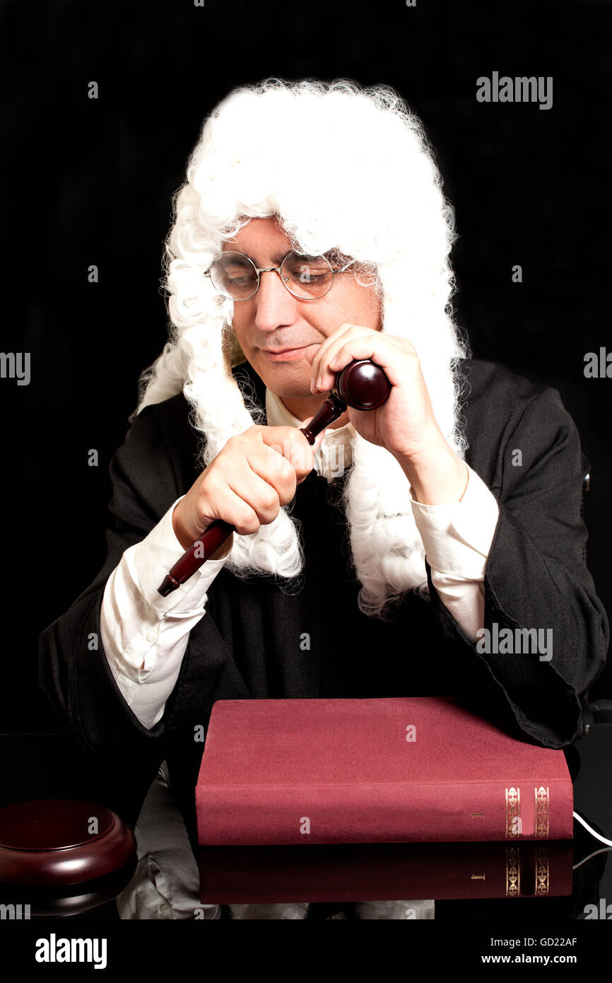 Portrait Of Male Lawyer with Judge Gavel And Book on black background Stock Photo Alamy