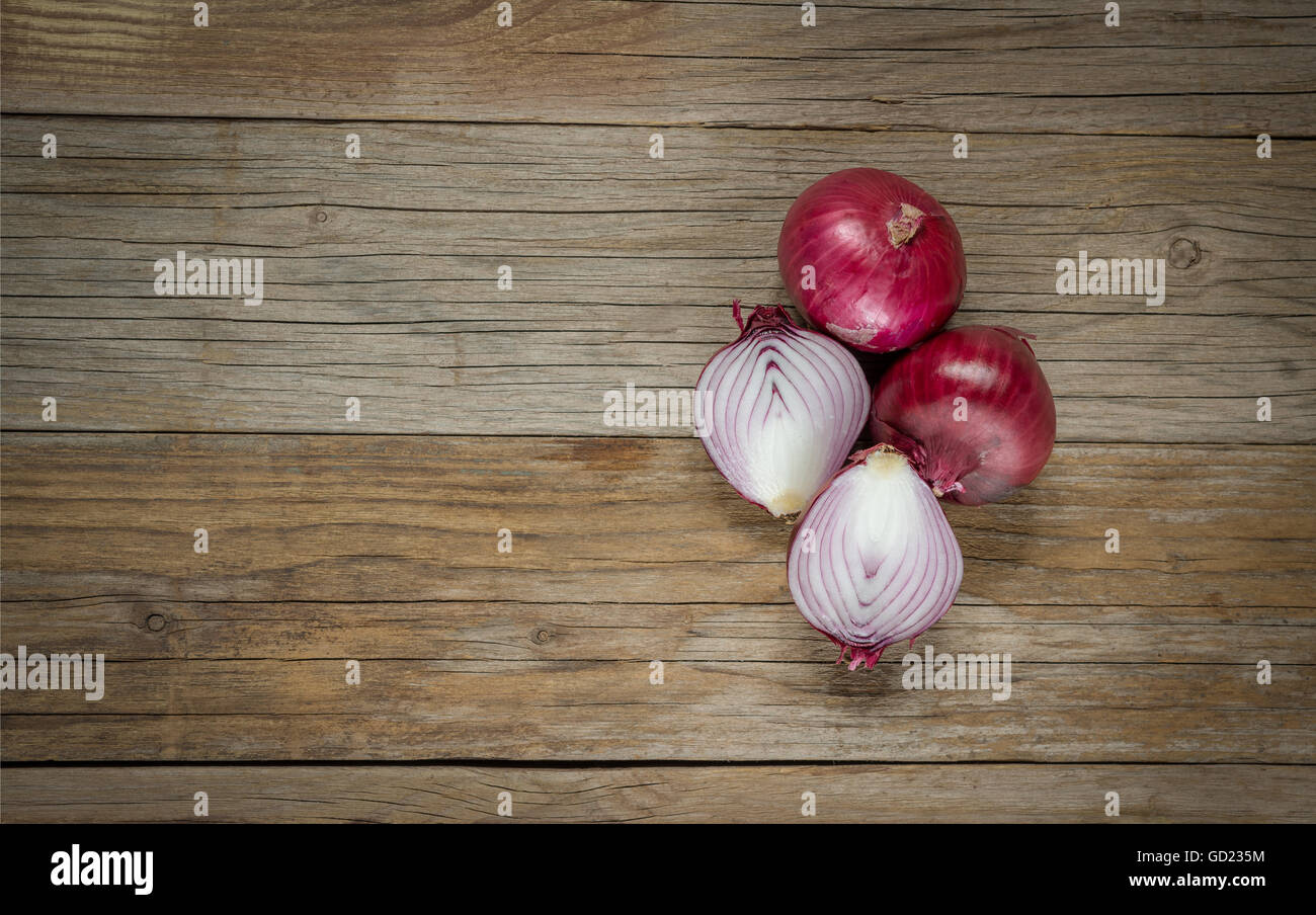 Onion on wooden table hi-res stock photography and images - Alamy