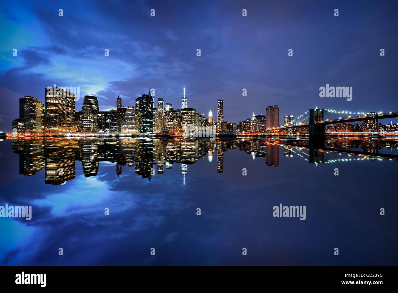 Brooklyn Bridge and Manhattan skyline at dusk, New York City, New York ...
