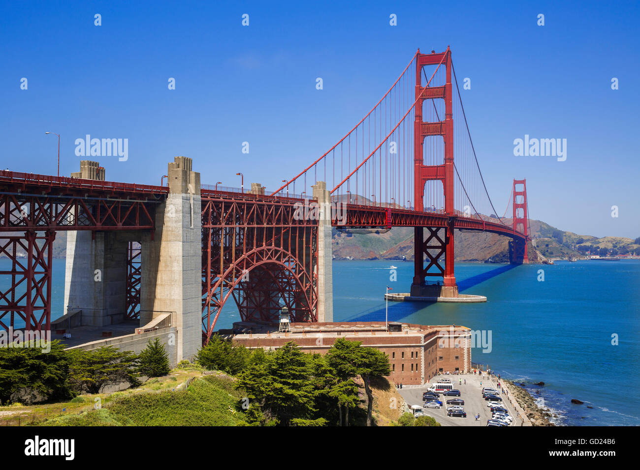 San Francisco Golden Gate Bridge with Fort George in the foreground at the edge of the Pacific Ocean, California, USA Stock Photo