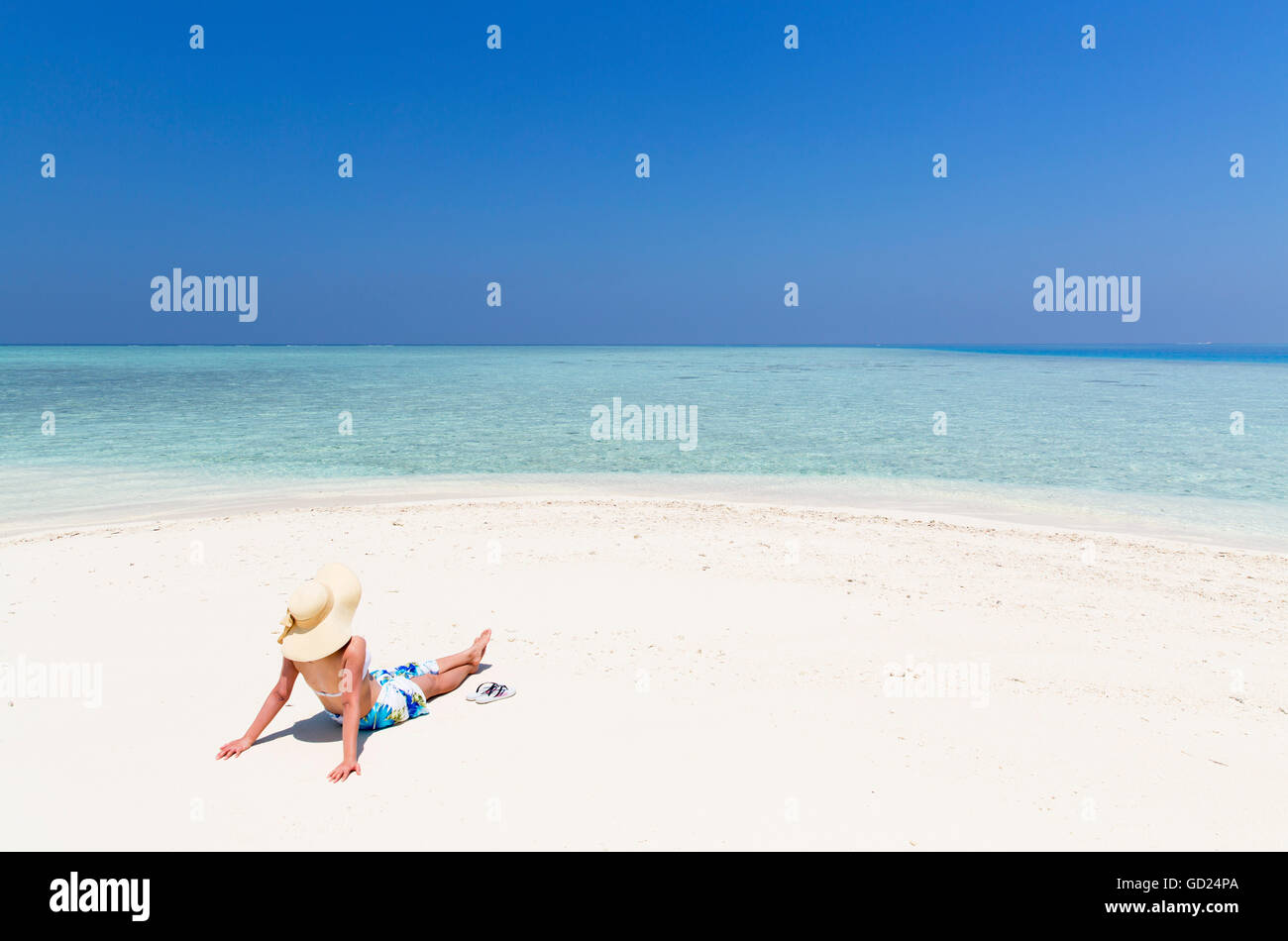 Woman on sandbank, Kaafu Atoll, Maldives, Indian Ocean, Asia Stock Photo