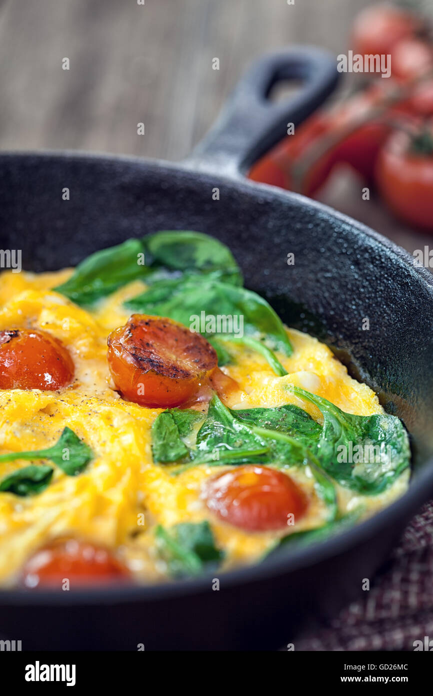 Spinach frittata in iron skillet Stock Photo Alamy