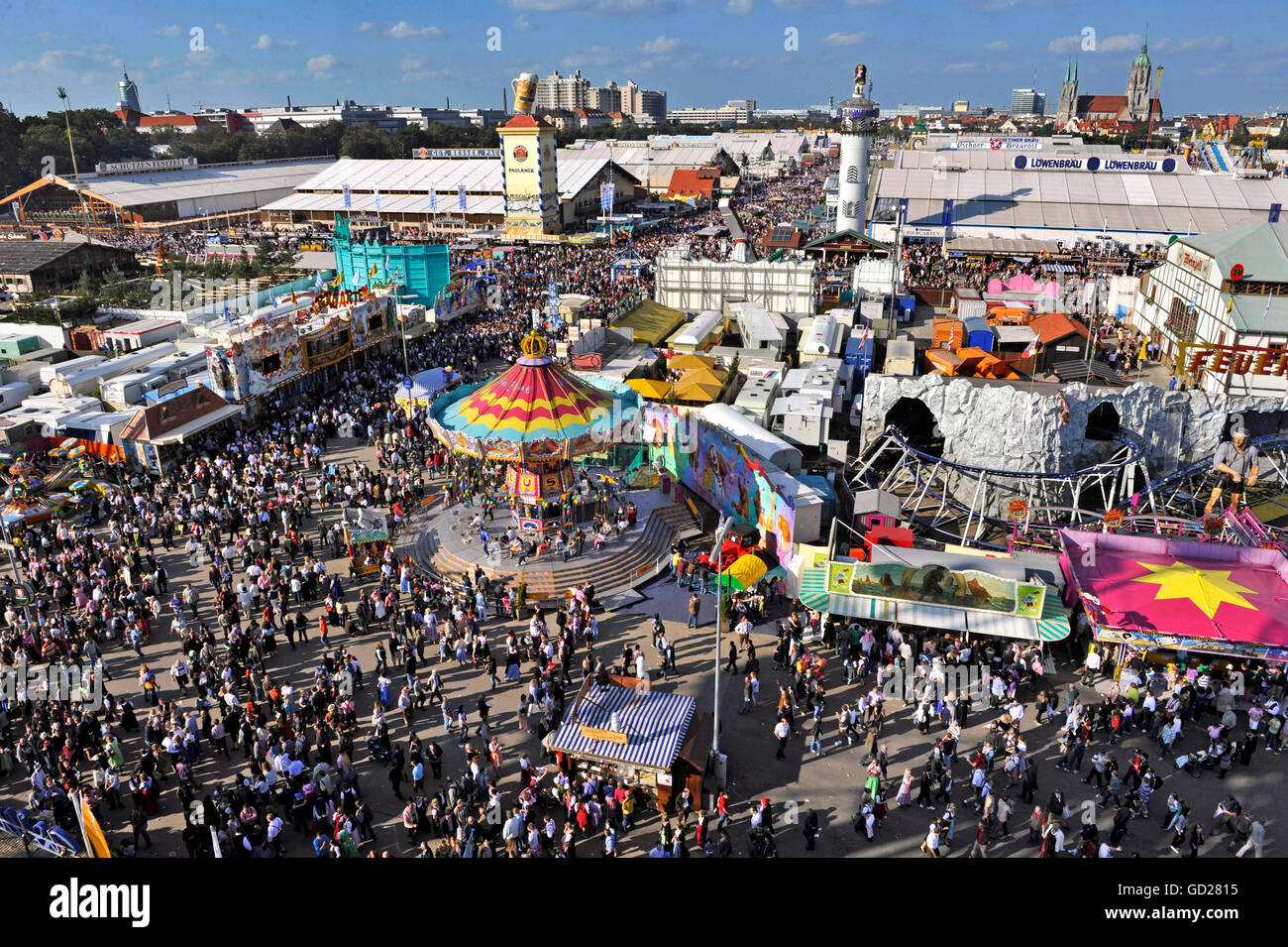 festival,funfair,oktoberfest Munich,overview from the ferries wheel,19.09.2010,above,beer tent,beer tents,in background St. Paul,funfair,carnival,Therese's Green,crowd,crowds,crowds of people,crowd of people,typical,Bavarian,Bavaria,weekend,weekends,Wiesn Weekend,Sunday afternoon,weather,weathers,fair,beautiful,clear,joy,leisure time,free time,spare time,inhabitants of Munich,inhabitant of Munich,anniversary of 200 years Oktoberfest,1810 bis 2010,bird's-eye view,festival,festivals,Ferris wheel,big wheel,Ferris wheels,bi,Additional-Rights-Clearences-Not Available Stock Photo