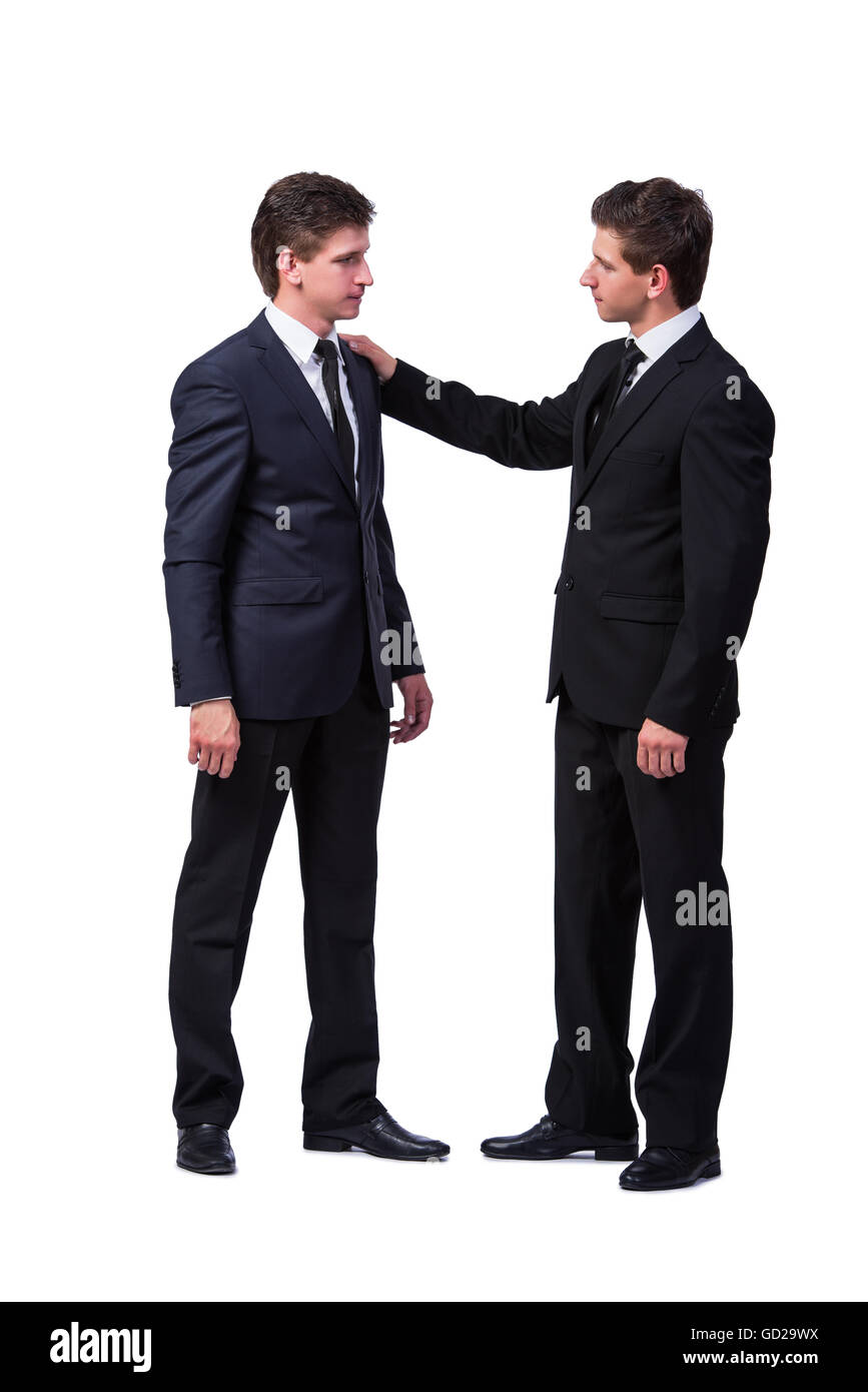 Two twin brothers handshaking isolated on white Stock Photo - Alamy