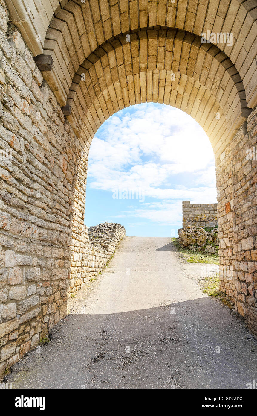 Entrance to the old fortress on a sky background. Stock Photo