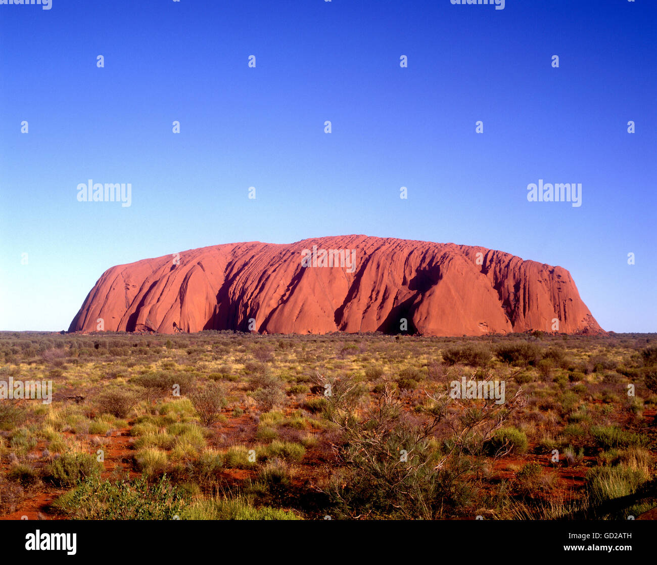 Australia Northern Territory Ayers Rock (Uluru) in evening light  Adrian Baker Stock Photo