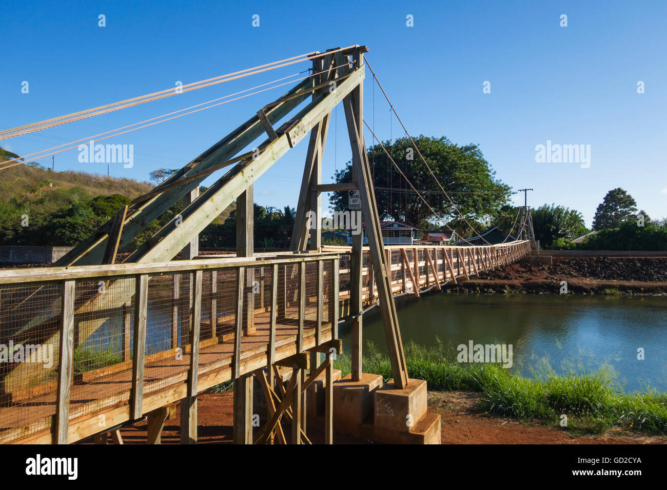 Hanapepe swinging bridge over the Hanapepe River; Hanapepe, Kauai, Hawaii, United States of America Stock Photo