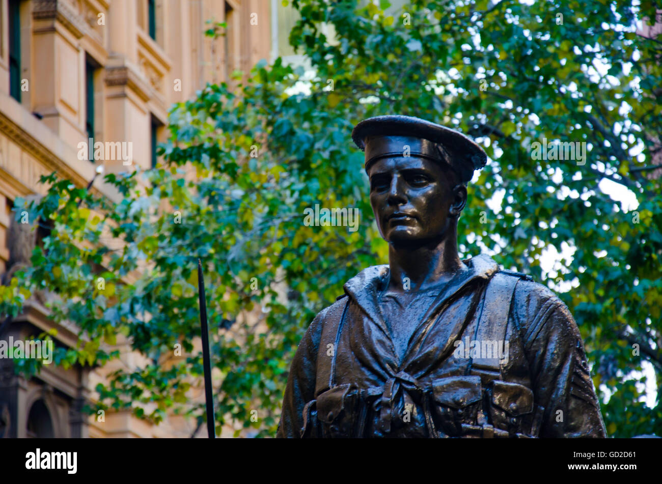 A full size bronze statue of an Australian sailor stands tall in Martin Place, Sydney, Australia
