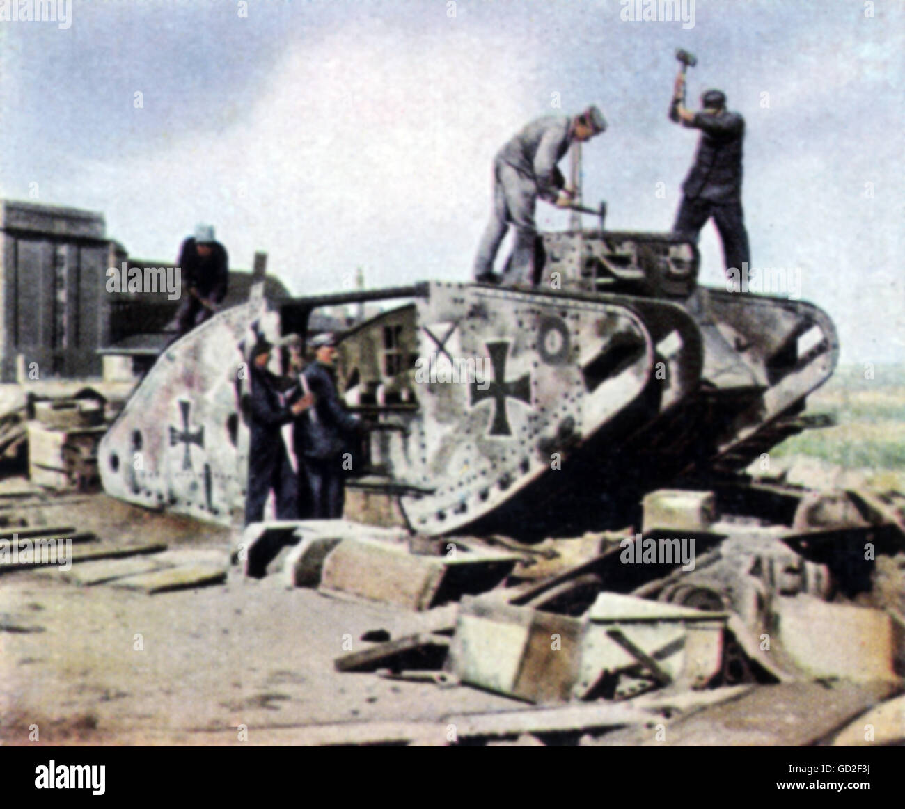 politics, demobilization of the German Army according to articles of the Versailles Treaty, demounting a tank of British design, 1920, coloured photograph, cigarette card, series 'Die Nachkriegszeit', 1935, Additional-Rights-Clearences-Not Available Stock Photo
