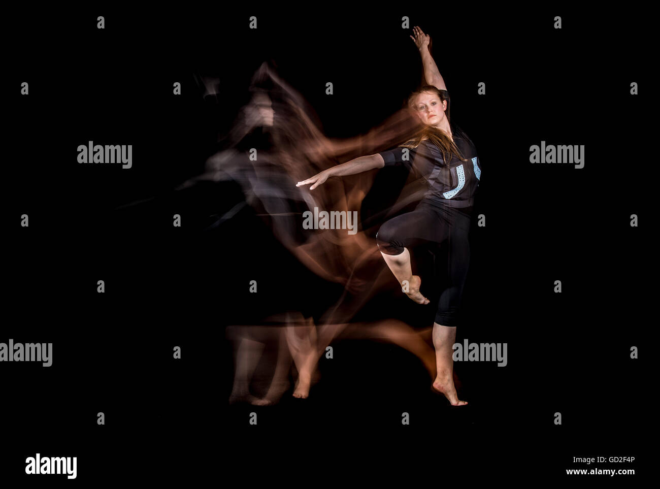 dancer woman jumping light movement blur Stock Photo