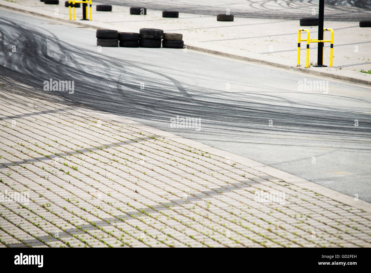 Tyre burnout marks on asphalt road Stock Photo - Alamy