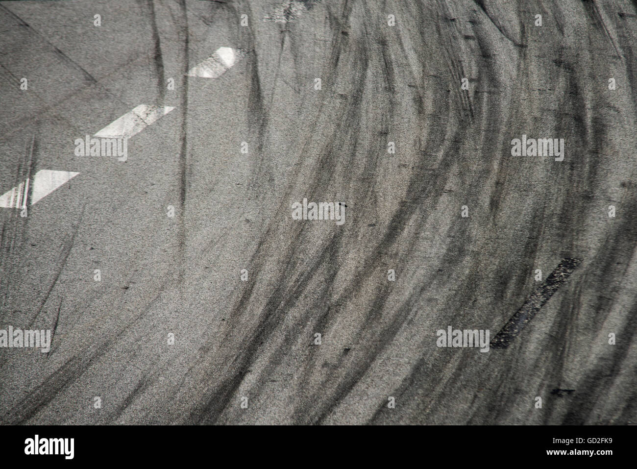 Tyre burnout marks on asphalt road Stock Photo - Alamy