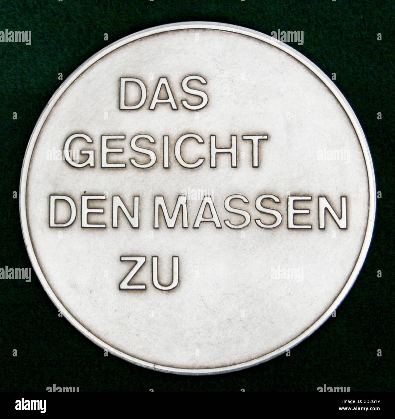 decorations, Hans Otto Medal, silver, reverse side, imprint: 'Das Gesicht den Massen zu', East German decoration of merit for excellent acting, donated for the commemorate to the antifascist actor and member of the resistance Hans Otto, concept: unknown, Additional-Rights-Clearences-Not Available Stock Photo