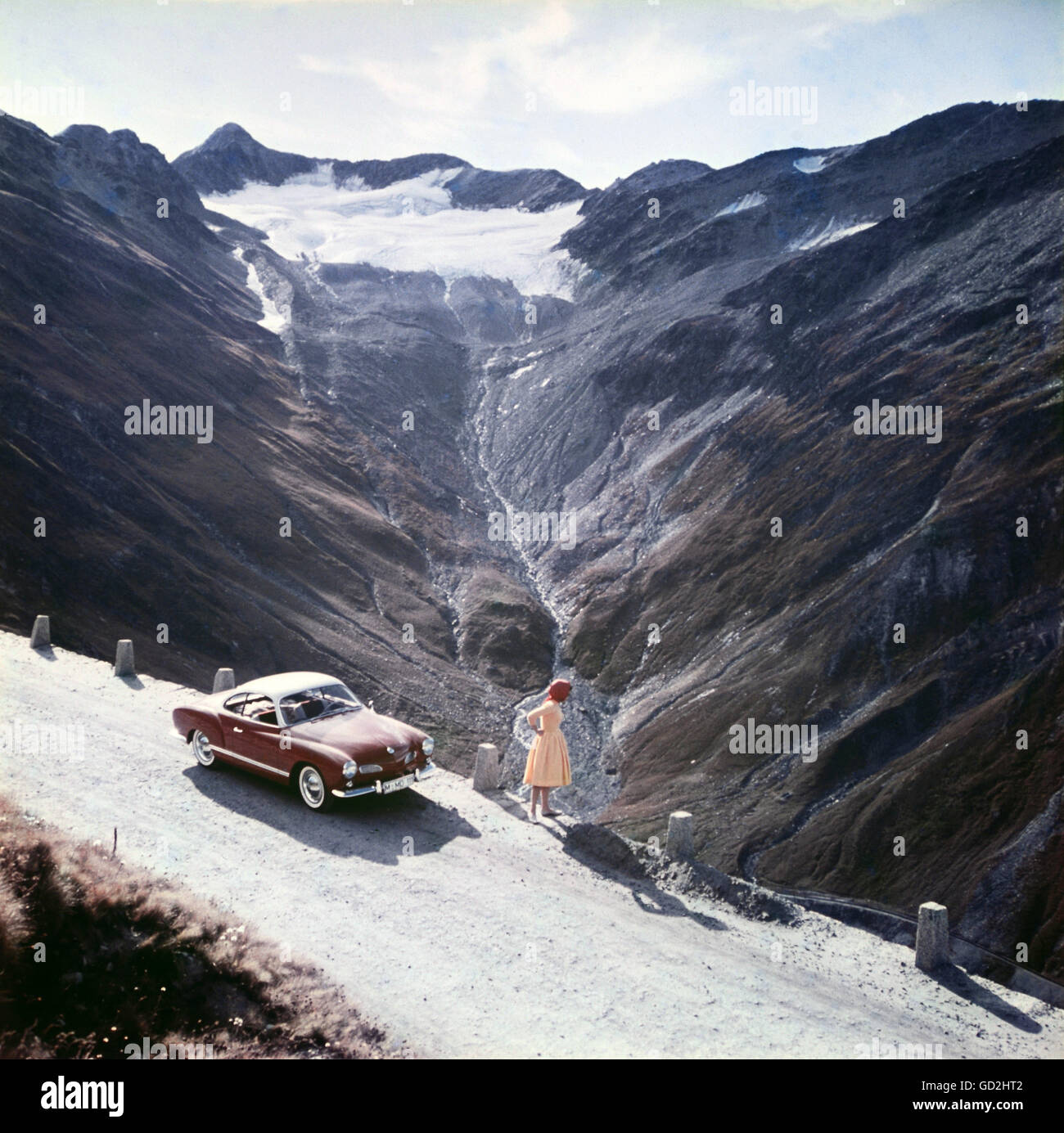 transport / transportation, cars, Volkswagen, VW 1500 Karmann-Ghia coupe, vehicle variants 14, rest on a mountain road, circa 1960, vehicle, vehicles, people, woman, women, female, mounts, mount, mountains, mountain, Alps, glacier, glaciers, road, roads, journey, holiday, vacation, holidays, leisure time, free time, spare time, 20th century, Karmann Ghia, transport, transportation, cars, car, vehicle variants, vehicle variants, historic, historical, 1950s, 1960s, Additional-Rights-Clearences-Not Available Stock Photo
