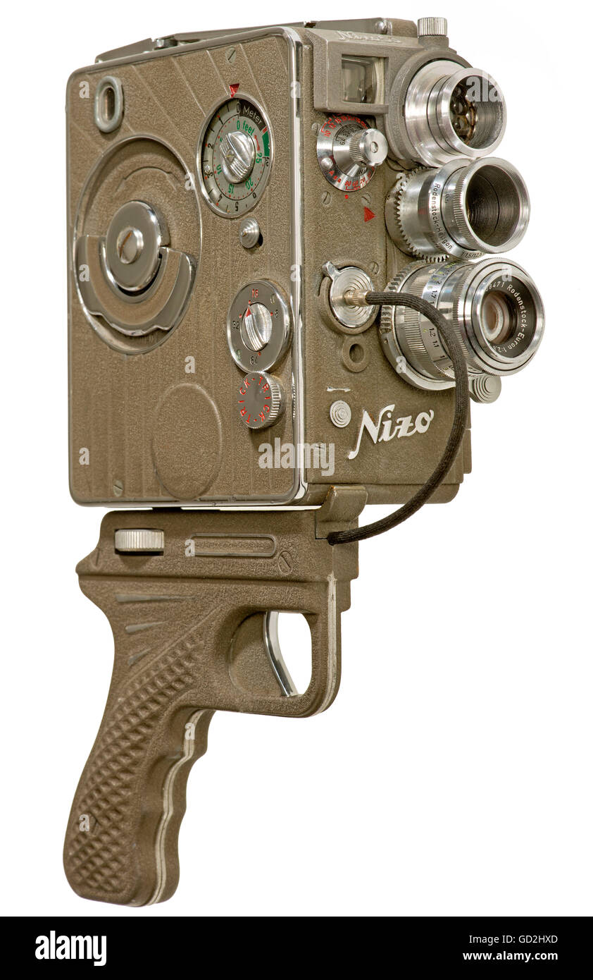 movie,Nizo Heliomatic 8 S2R,8mm cine camera,with screwed pistol grip and cable trigger,made by Niezoldi & Kraemer,Munich,Germany,1954,narrow film camera,objective,objectives,interchangeable lenses,2 lens,Rodenstock Heligon 1.5,12.5mm and Rodenstock Euron,telephoto 2.8,37.5mm,exposure meter,exposure meters,spring drive by hand,case metal and chrome,very expensive and noble realized camera,original price at that time: 995 DM,making a film,filming,make a film,handle bar,handle bars,gimmick button,product,products,stills,clipping,cu,Additional-Rights-Clearences-Not Available Stock Photo