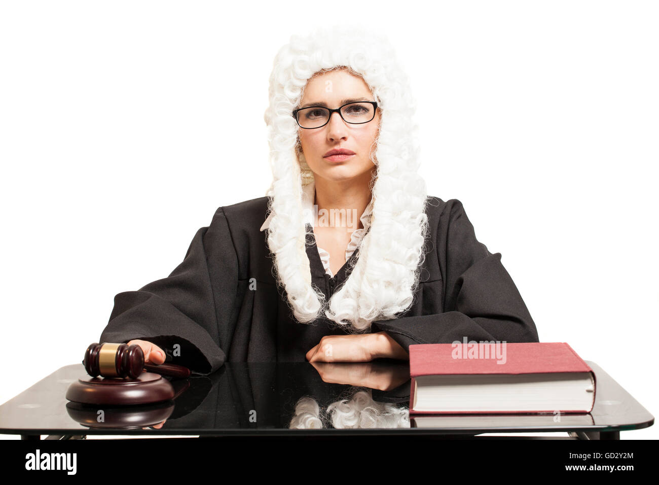 Female judge wearing a wig and Back mantle with eyeglasses with judge