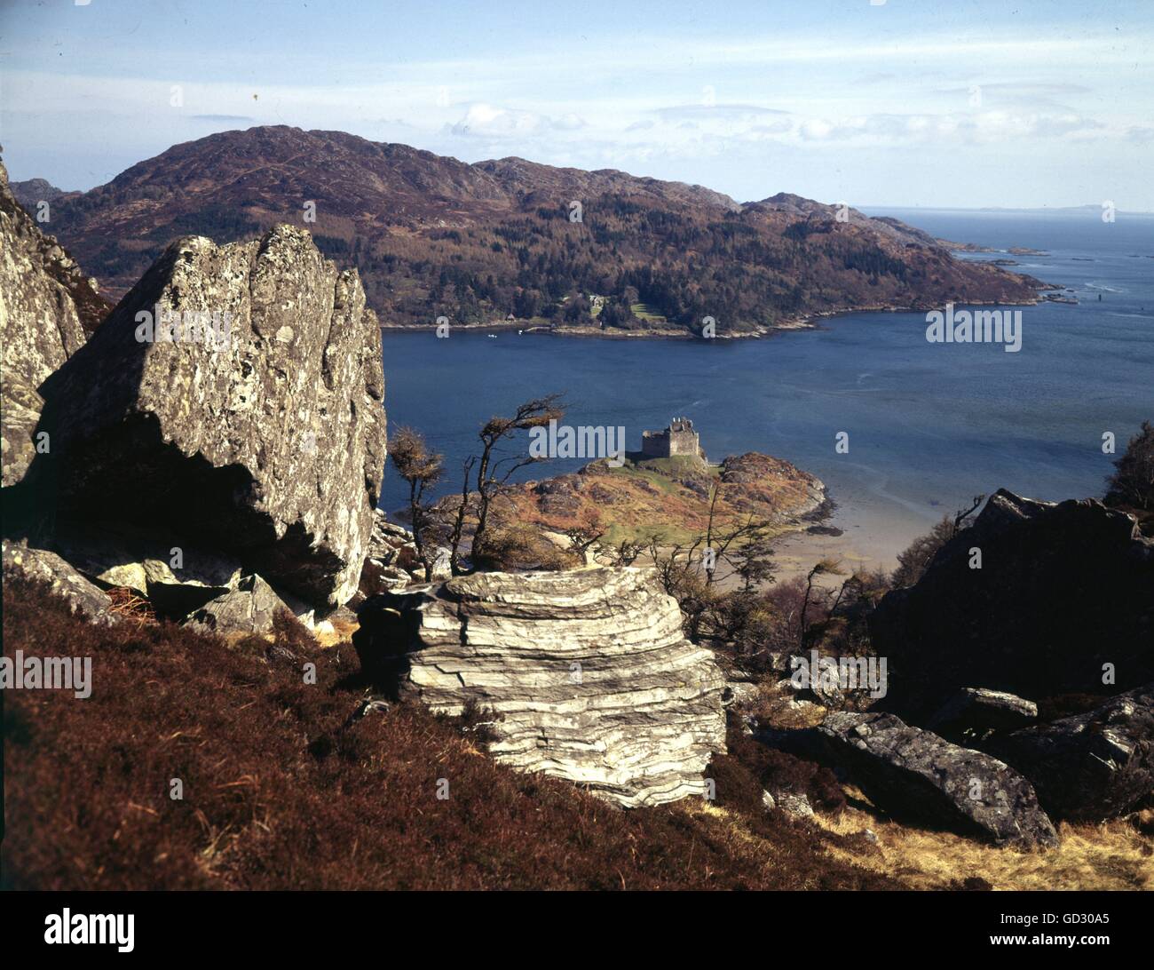 Scotland, Highlands. Castle Tioram on it's little islet on Loch Moidart. Note the rock stratum. Circa 1985.    Scanned from a 5' Stock Photo