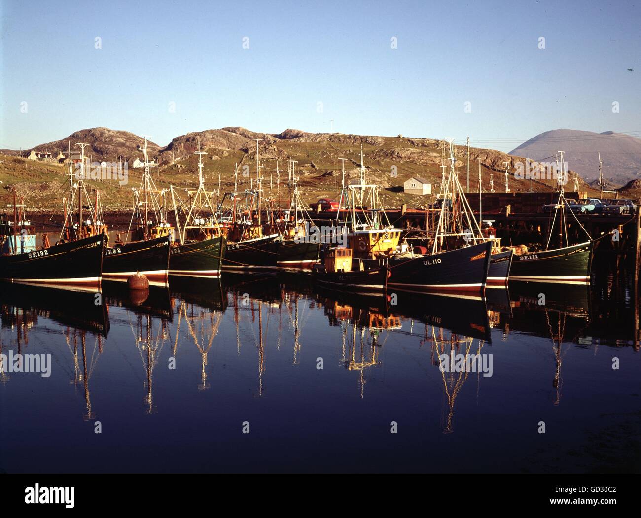 Scotland, Sutherland. Kinlochbervie, with the trawler fleet in harbour on a bright Sunday evening. Circa 1973.    Scanned from a Stock Photo