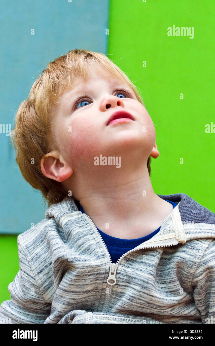 Toddler looking up Stock Photo