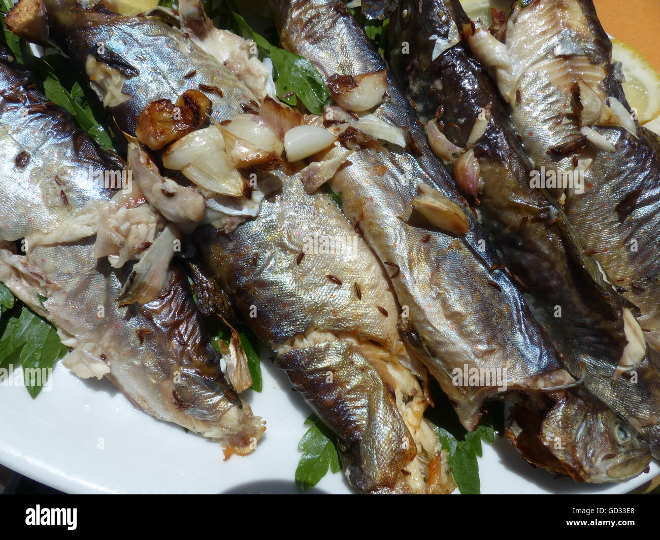 trout with garlic Stock Photo Alamy