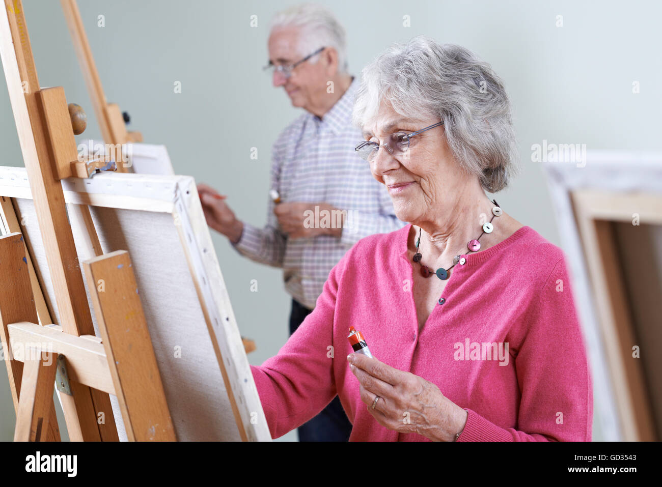 Seniors Attending Painting Class Together Stock Photo Alamy