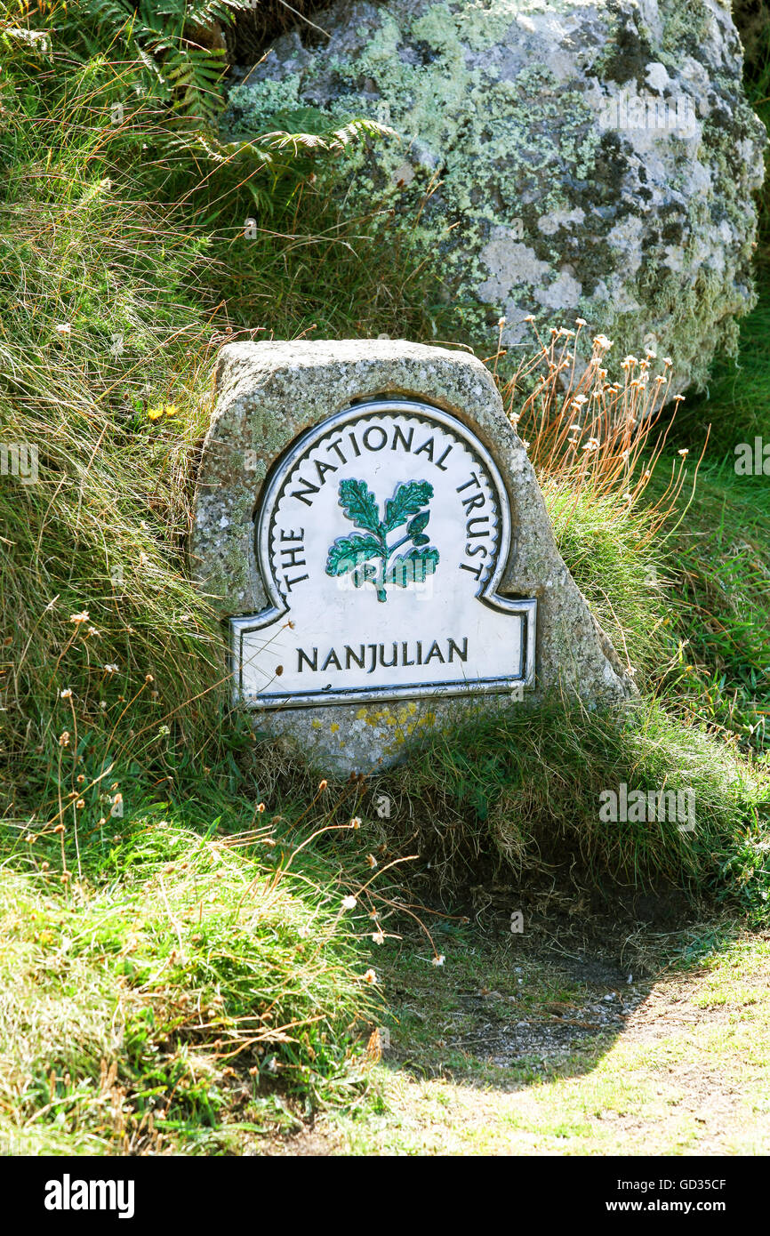 A National Trust omega sign at Nanjulian Cornwall England UK *TAKEN FROM PUBLIC FOOTPATH* Stock Photo