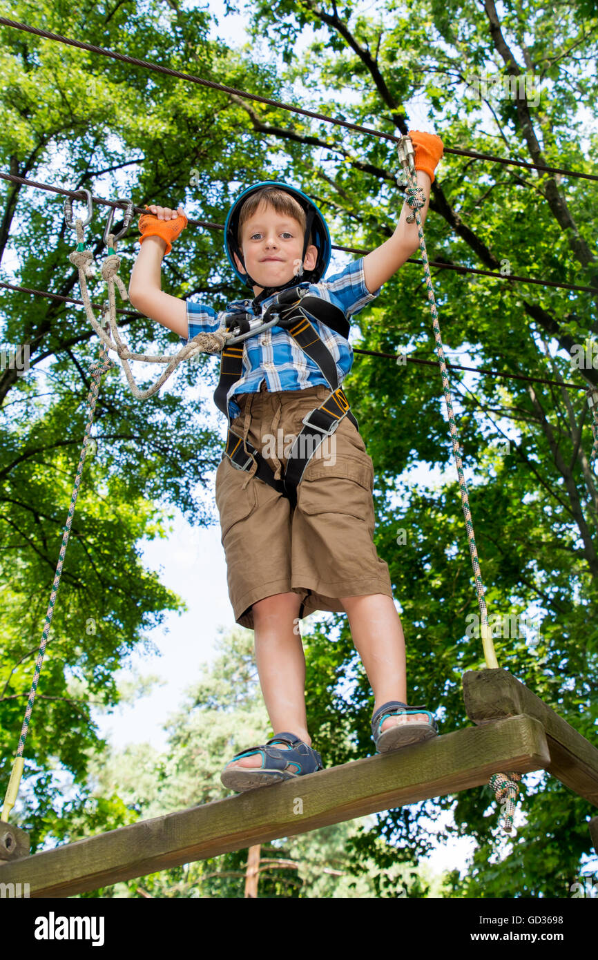 Boy Using A Rope Five year boy on rope hi-res stock photography and images - Alamy