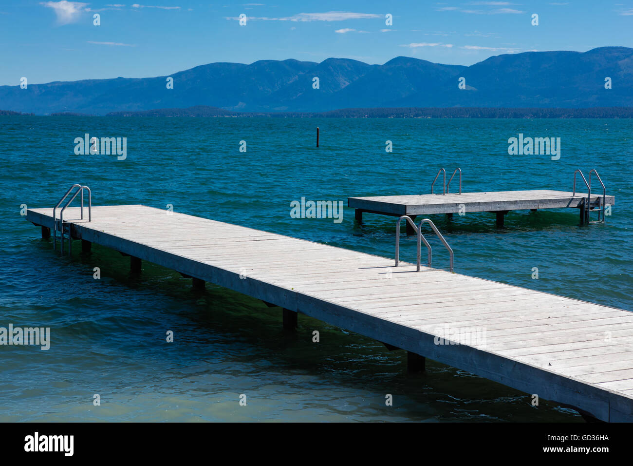 Swim docks on a tranquil Flathead Lake in Polson, Montana, USA Stock