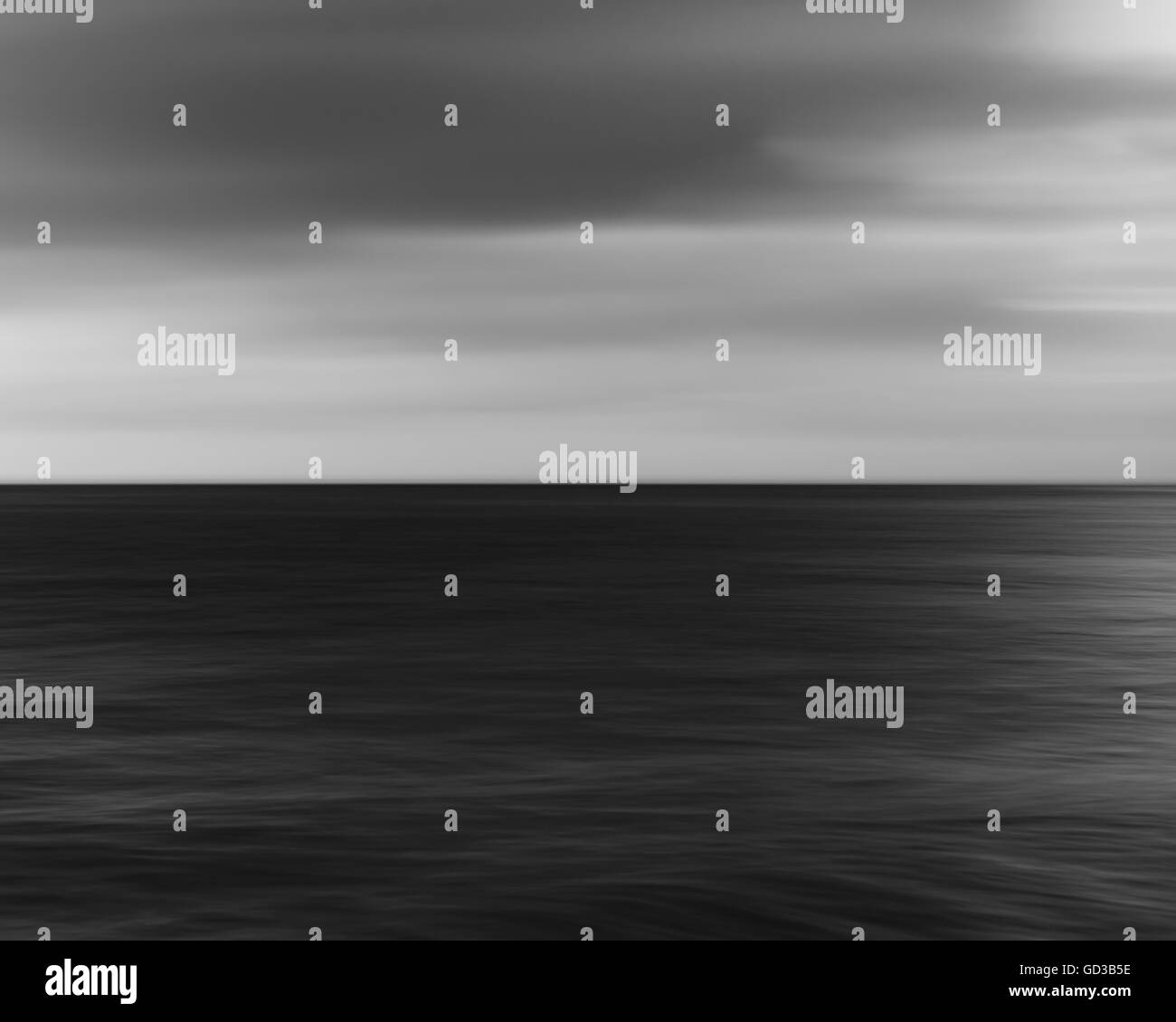 Blurred motion, the sea at dusk. Stock Photo