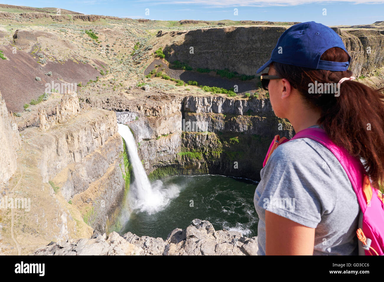 A woman looking out at 'Palouse Falls' -  State Park, Washington, USA Stock Photo