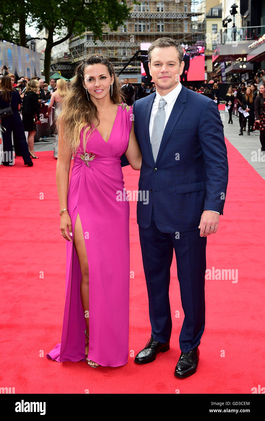 Matt Damon and wife Luciana Barroso attending the European premiere of Jason Bourne held at Odeon Cinema in Leicester Square, London. Stock Photo