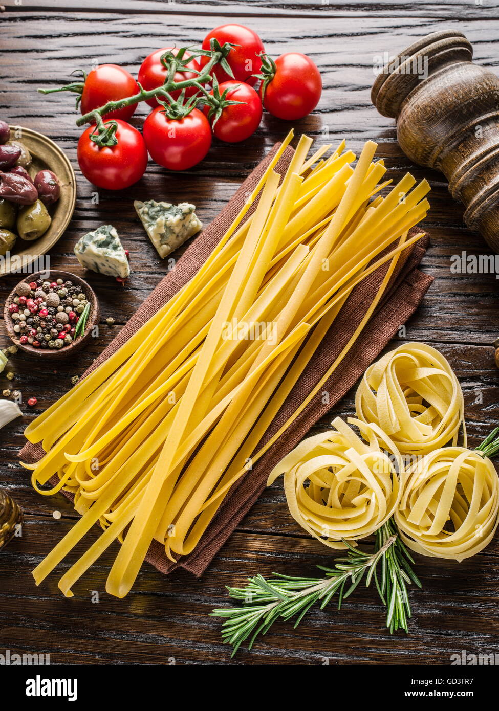 Pasta ingredients. Cherrytomatoes, spaghetti pasta, rosemary and