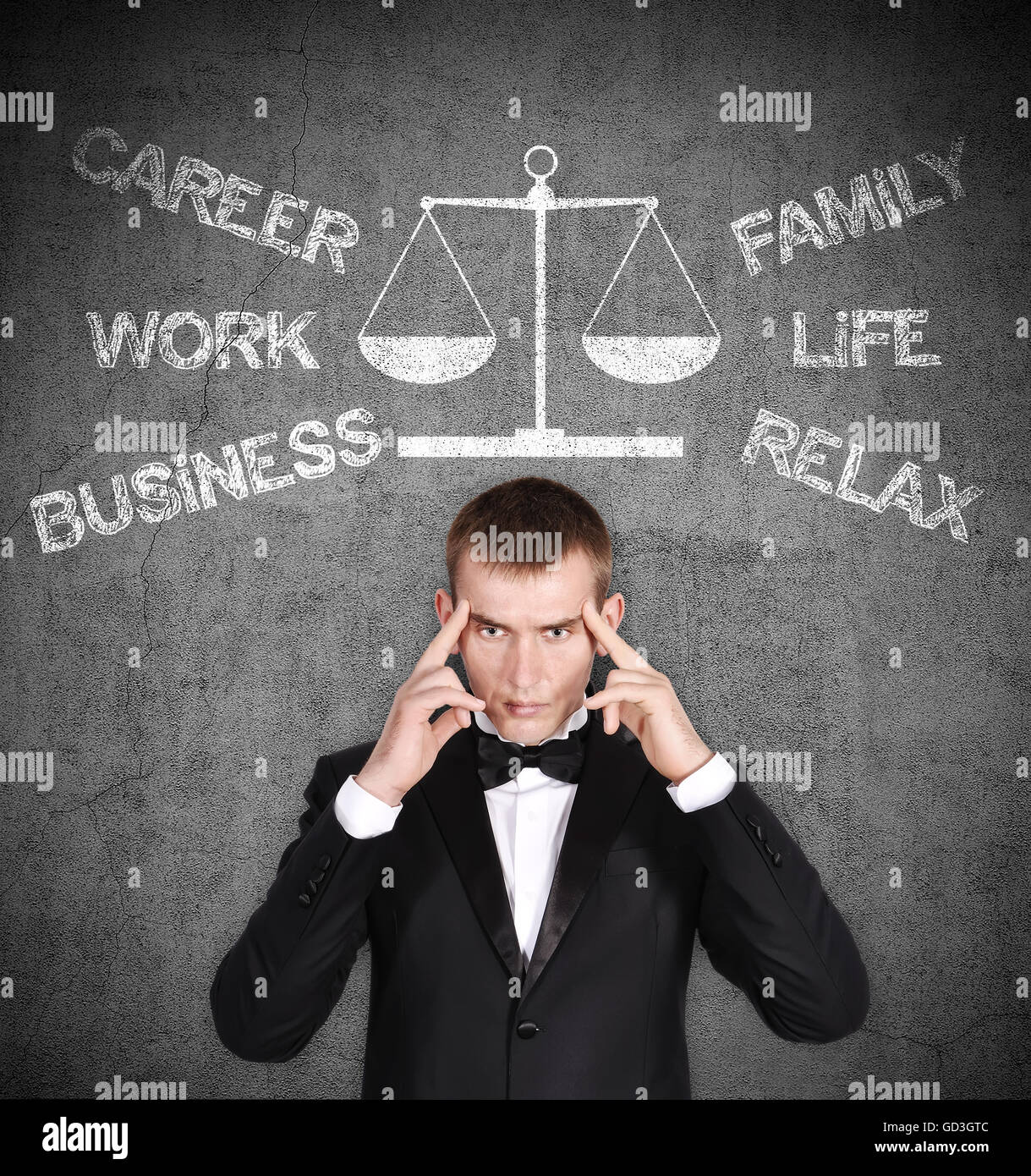 businessman thinking, choose between career and family Stock Photo