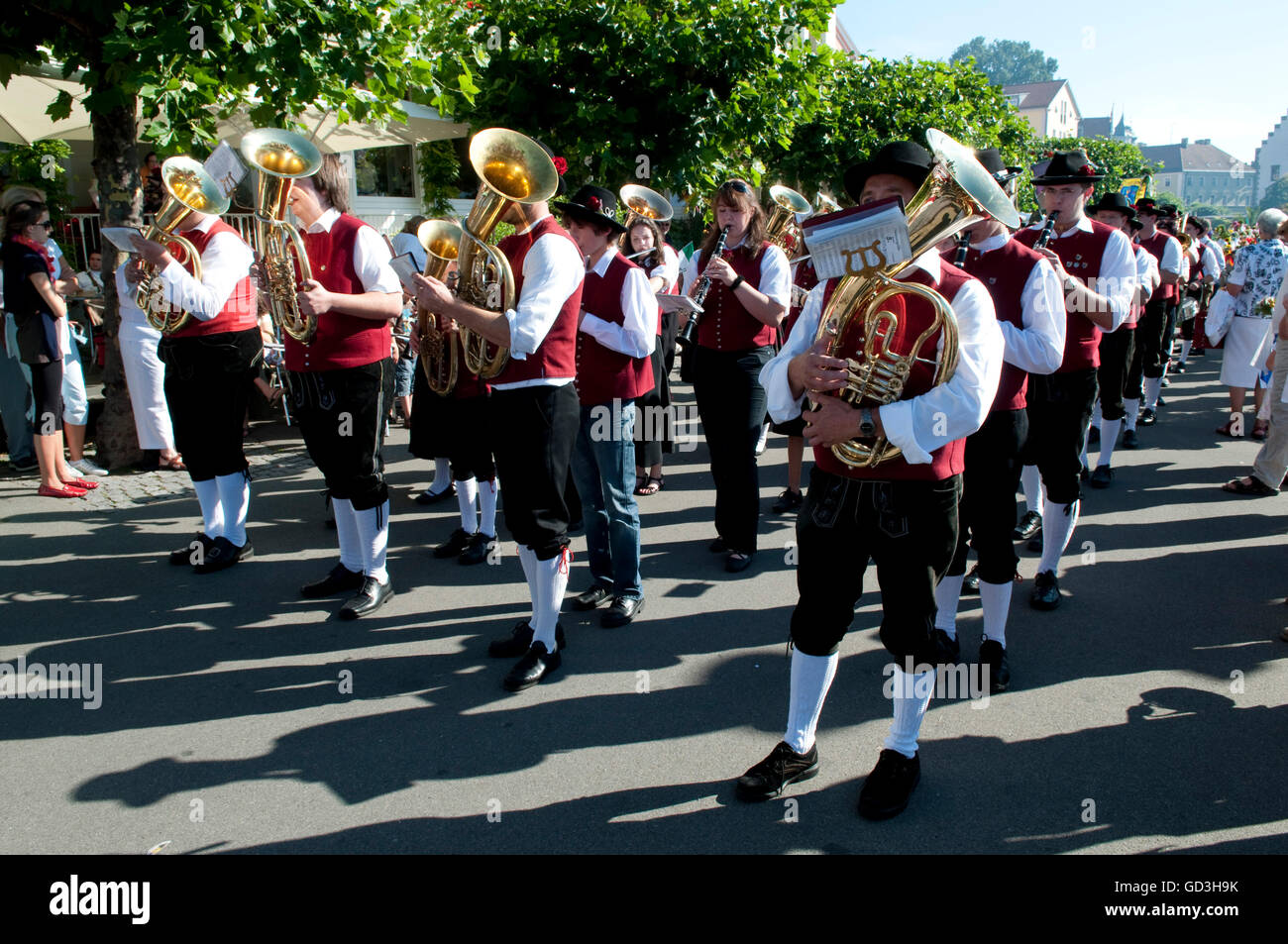 Band wearing traditional costumes, brass band marching in the procession of the Lindau Children